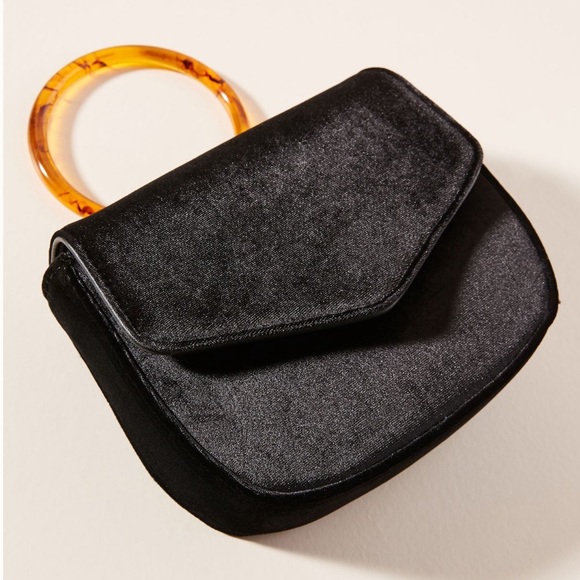 Anthropologie Handbags - Anthropologie lucite handle purse